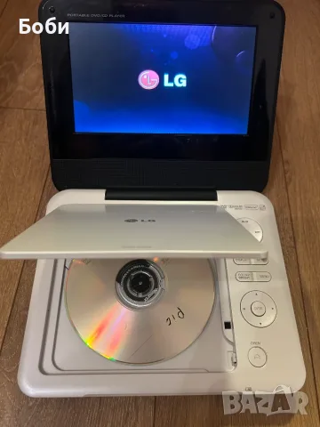 LG portable DVD player DP 450, снимка 2 - Плейъри, домашно кино, прожектори - 56302391