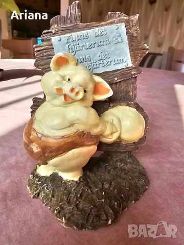 Закачлива статуетка.