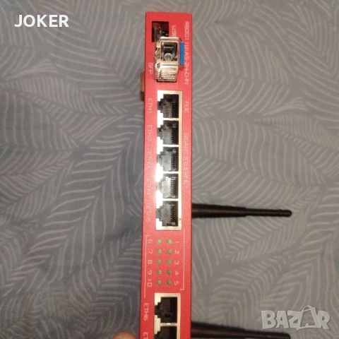 Mikrotik RB2011UAS-2HnD-IN, снимка 4 - Рутери - 52541750