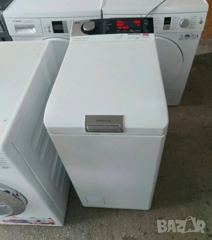 Пералня AEG 7000 с горно зареждане А+++