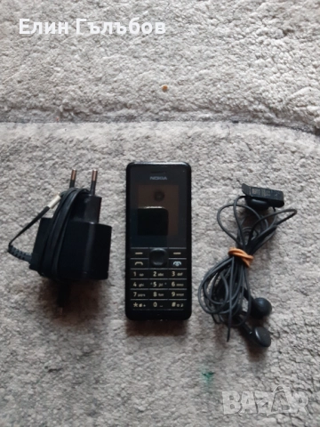Мобилен телефон NOKIA 107, със зарядно у-во и слушалки