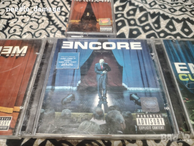  Български лицензни дискове и касета на Eminem