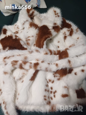 Естествен косъм палто.