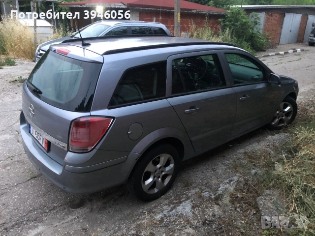 Опел Астра 1,9 6ск Навигация , снимка 15 - Автомобили и джипове - 52887975