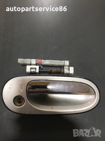 Външна дръжка на предната дясна врата сребриста за Nissan Almera N16 (2003) Sa830613