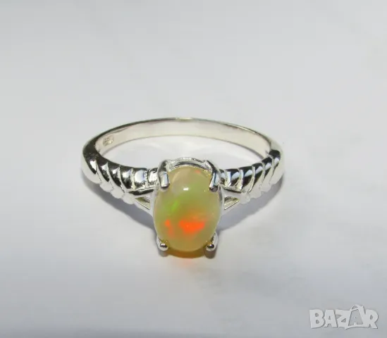 925 сребърен пръстен с огнен опал от Етиопия. Камък 7x5мм, тегло на пръстена 3гр. Халка 6.5/53., снимка 1