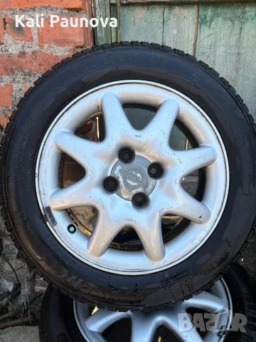 Комплект 4 бр. зимни гуми Riken Snow 185/60 R15 с оригинални алуминиеви джанти за Opel (4x100)