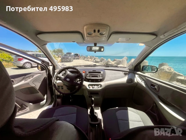 Nissan Almera Tino, снимка 9 - Автомобили и джипове - 50971638