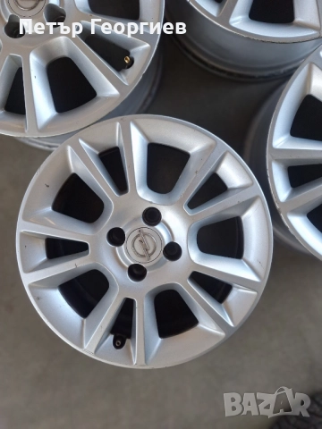 ОРИГИНАЛНИ АЛУМИНИЕВИ ДЖАНТИ-ОПЕЛ -4Х100Х56.6-16 ЦОЛА, снимка 2 - Гуми и джанти - 52909495