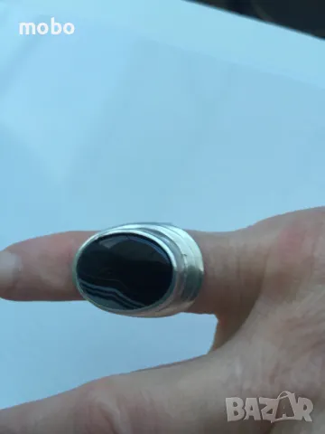 Красив нов сребърен пръстен с черно-бял  камък , тегло 11.94г,  проба 925. 