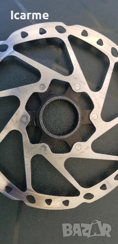 Диск Shimano SM-RT64-M 180mm, снимка 2 - Части за велосипеди - 51498161