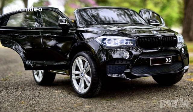 Двуместен джип Лицензиран BMW X6M 12V C MP3 с меки гуми с 2 Кожена седалка за 2 деца