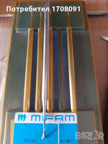 Инструмент за почистване на зъбен камък