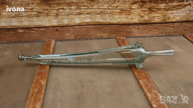 Празна бутилка във формата на риба