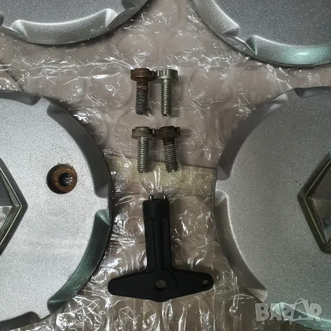 Капаци за джанти Рено, снимка 4 - Гуми и джанти - 49810609