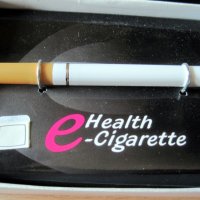 Нова електронна цигара, зарядно, пълнители с безникотинова течност, снимка 2 - Електронни цигари - 30144291