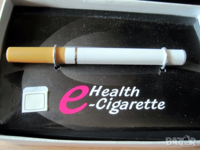 Нова електронна цигара, зарядно, пълнители с безникотинова течност, снимка 2 - Електронни цигари - 30144291