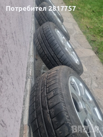 14 цола 4х100 4 броя алуминиеви джанти с гуми 185/60/14, снимка 3 - Гуми и джанти - 52267659