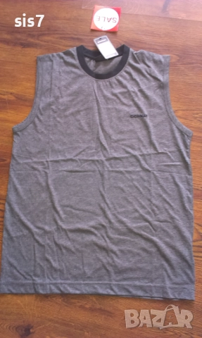 нов потник Donnay размер M само 7 лв.