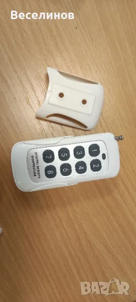 Дистанционно управление 8 канала 433MHz с холдър - 50броя, снимка 1