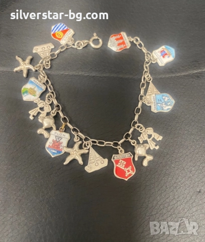 Сребърна гривна с талисмани 