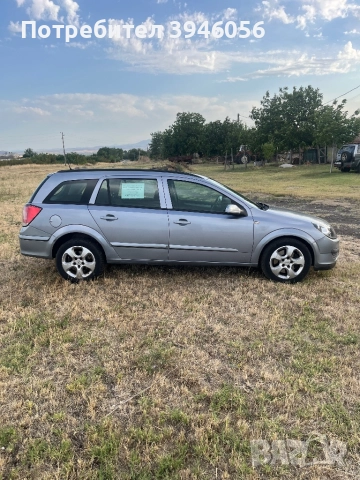 Опел Астра 1,9 6ск Навигация , снимка 2 - Автомобили и джипове - 52887975