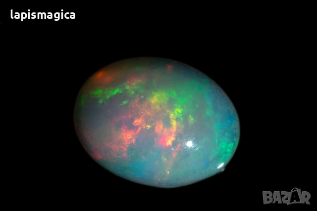 Етиопски опал 1.02ct 9x7mm овален кабошон, снимка 3 - Други - 52137384