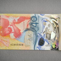 Банкнота - Източни Кариби - 2 долара (юбилейна) UNC | 2023г., снимка 2 - Нумизматика и бонистика - 44924004