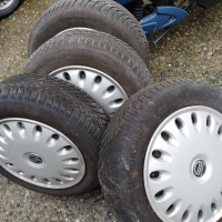 Зимни гуми с джанти Michelin и Continental 4 броя за Volvo S\V 40, снимка 1 - Гуми и джанти - 44657217