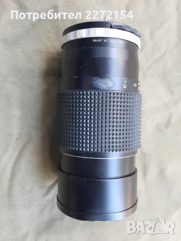 Голям обектив за фотоапарат със сенник
