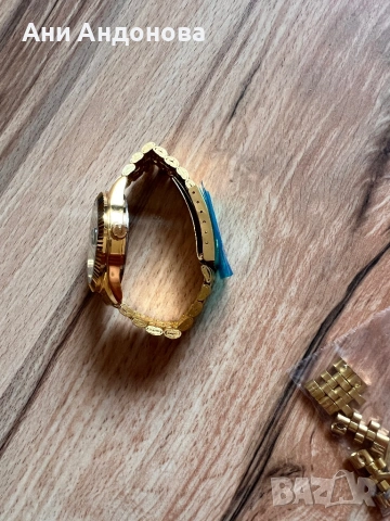 Дамски часовник жълто злато, снимка 3 - Дамски - 53042740