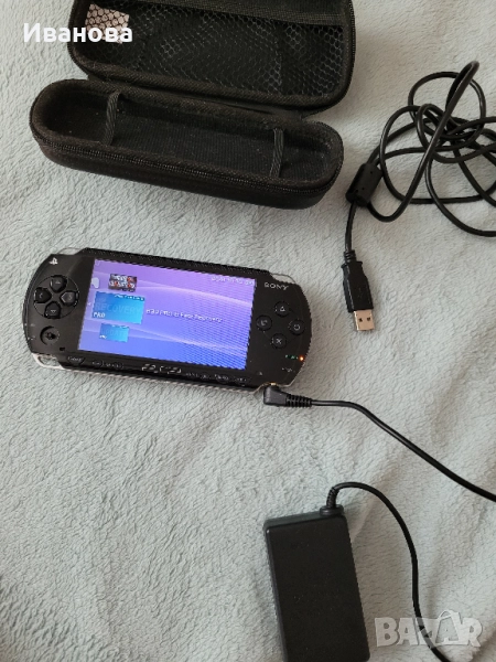 PSP 1003 - пълен комплект хакнато с 2 игри всичко работи - 200лв, снимка 1