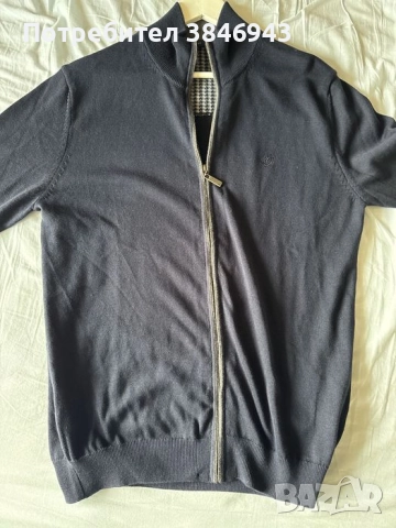 Не е намачкана от камерата е.Чисто нова жилетка MCL.