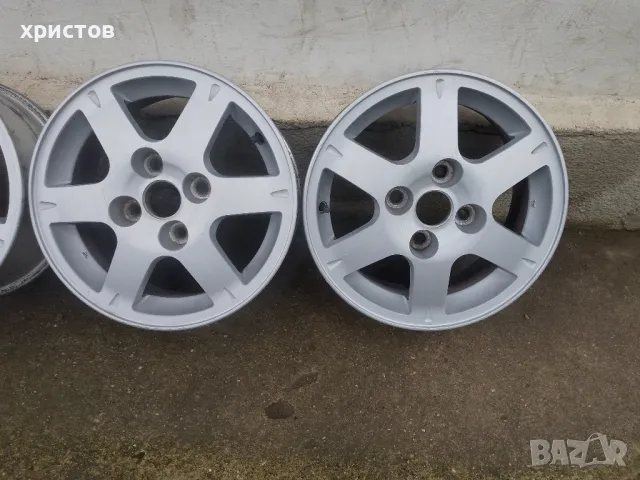 Лети джанти 15  4х14.3  Митсубиши , снимка 2 - Гуми и джанти - 41553049