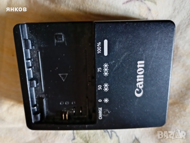 Оригинално зарядно с батерия за Canon., снимка 3 - Батерии, зарядни - 53947606