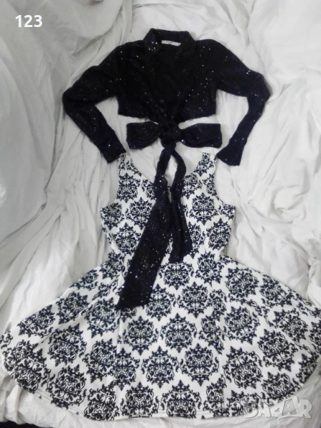 Спортно-елегантна немачкаща се рокля с кралски мотиви и оригнална горна част, снимка 1