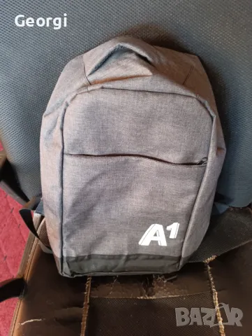 Нова брандирана раница за лаптоп.