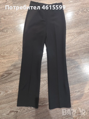 Елегантен панталон с цепки на Zara