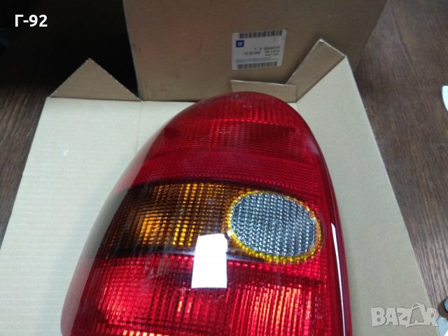 90444141_GM**NEU**OPEL CORSA B 03.93-09.00 Стоп, страна на монтаж: лява,  оранжев, цвят 