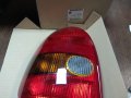90444141_GM**NEU**OPEL CORSA B 03.93-09.00 Стоп, страна на монтаж: лява,  оранжев, цвят , снимка 1