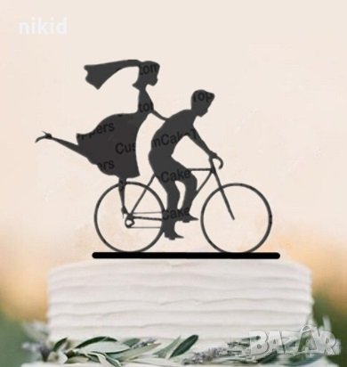 Момиче и Момче на велосипед черен мек брокатен топер украса декор за торта, снимка 1