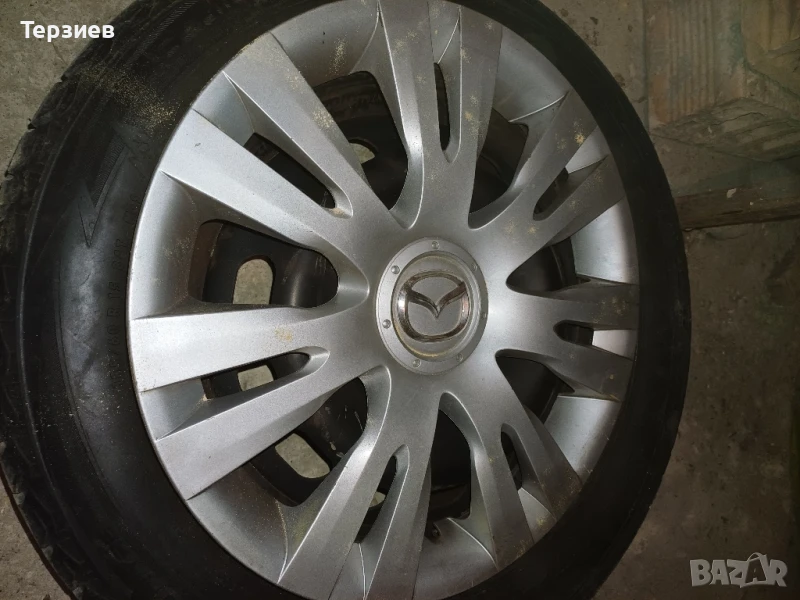 Продавам: 4 стоманени джанти с монтирани зимни гуми, снимка 1