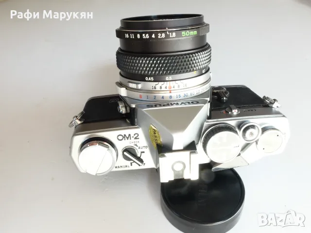 ЛЕГЕНДАРНИЯТ "OLYMPUS OM-2"- перфектен филмов комплект, снимка 4 - Фотоапарати - 55974064