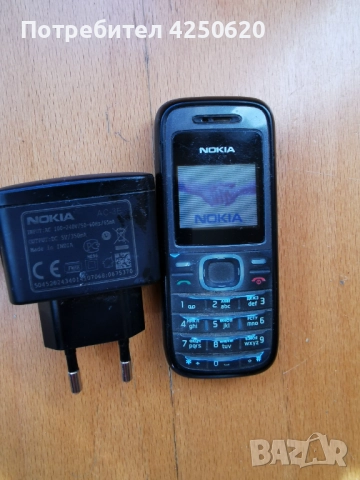 Телефон GSM Нокия 1208 с бутони и фенерче и радио бг меню, снимка 2 - Nokia - 50750404