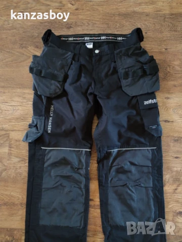 Helly Hansen Chelsea Construction Work Trousers - мъжки работен панталон 50/М КАТО НОВ, снимка 3 - Спортни дрехи, екипи - 50781287