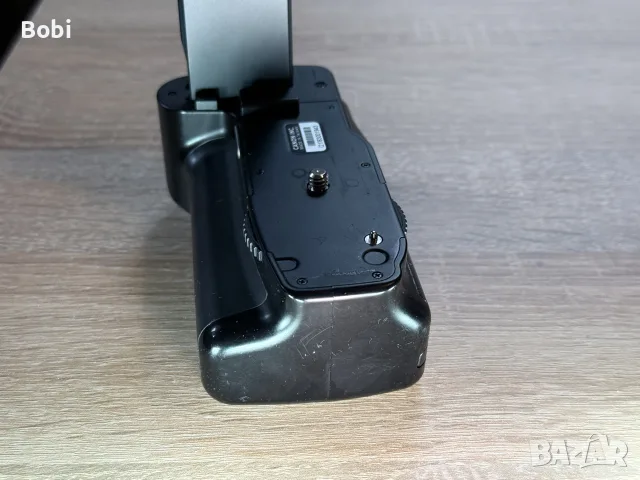 батериен грип Canon BG-E1, снимка 6 - Чанти, стативи, аксесоари - 56269392