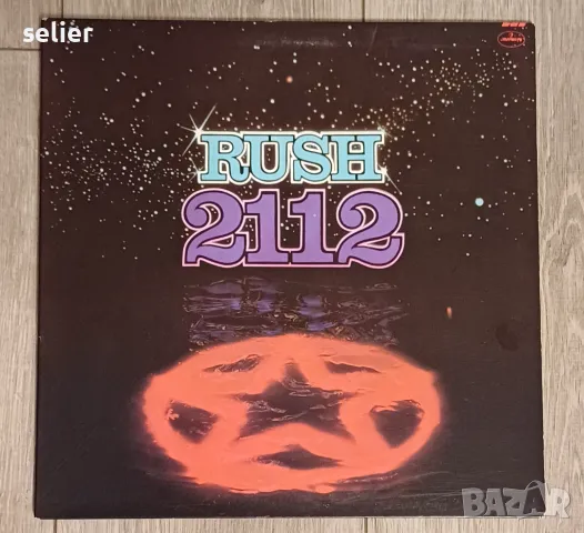 RUSH-2112 MADE IN USA - GATEFOLD Състояние на винила:от едната страна е NEAR MINT,от другата е VG++ 