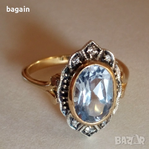 Сребърен пръстен с аквамарин и позлата.