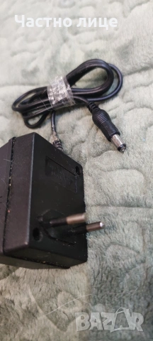 Зарядно AC-DC adapter 9V/0.85A , снимка 2 - Друга електроника - 53062487
