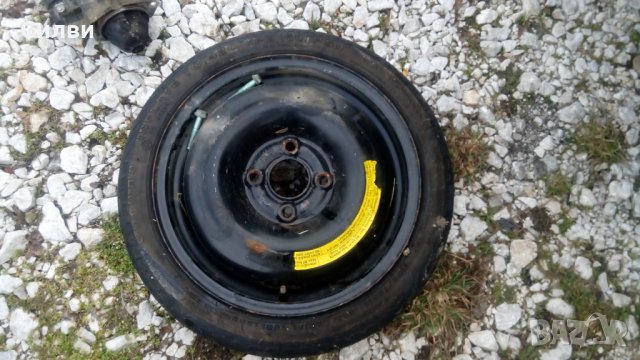 Патерица за Фолксваген Vw Поло Голф 3 и др. 4х100 57мм 105/70 R14 резервна гума Polo, снимка 1